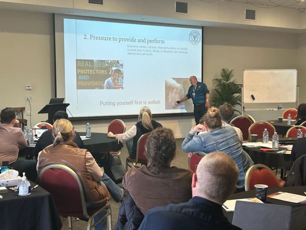 Quentin Counsell presenting on men's mental health at a workshop